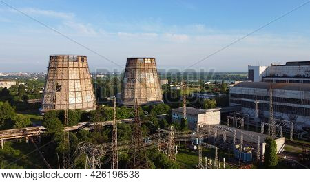 Aerial Drone View Flight Near Thermal Power Plant. Cooling Towers Of Chp
