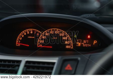 Novosibirsk, Russia - June 29, 2021: Toyota Vitz, Car Dashboard With Orange  Backlight: Odometer, Sp