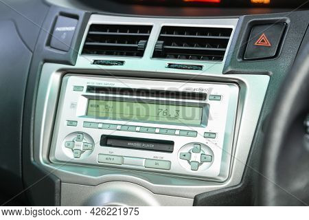 Novosibirsk, Russia - June 29, 2021: Toyota Vitz, A Close Up On A Black Panel With Radio,  Player An
