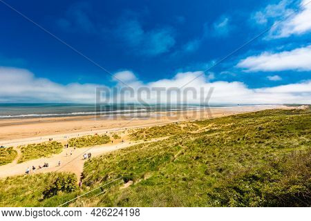 Sunny Cliffs and beach at Blackhall Rocks and Cromdon Dene Beach