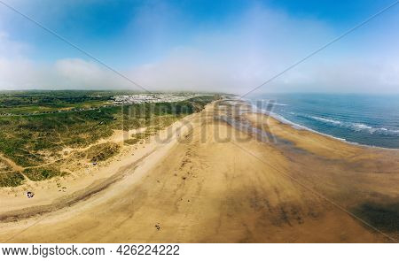 Sunny Cliffs and beach at Blackhall Rocks and Cromdon Dene Beach