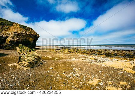 Sunny Cliffs and beach at Blackhall Rocks and Cromdon Dene Beach