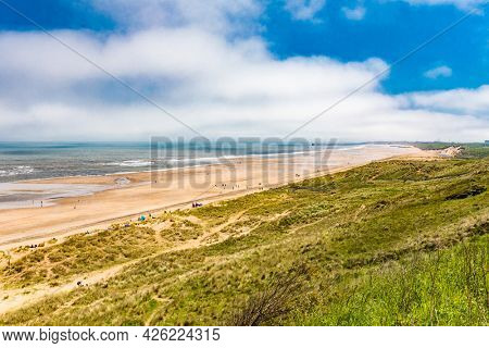 Sunny Cliffs and beach at Blackhall Rocks and Cromdon Dene Beach