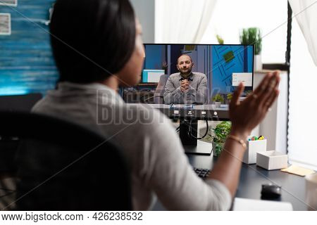 African American Woman Using University Elearning Platform Discussing With Remote Colleague During O