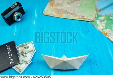 The Concept Of Travel And Recreation. Amera, Maps Geographic, Passport, Money, Bag, Glasses, Sunscre