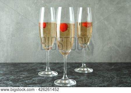 Concept Of Delicious Drink With Rossini Cocktail On Black Smoke Table