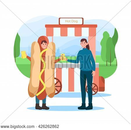 Female Character Is Giving Away Flyers In Hot Dog Costume Near Hot Dog Kiosk. Concept Of Advertiseme