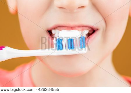 Health Care, Dental Hygiene. Joyful Child Shows Toothbrushes. Little Boy Cleaning Teeth. Dental Hygi