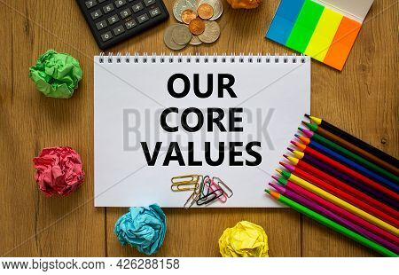 Our Core Values Symbol. White Note With Words 'our Core Values' On Beautiful Wooden Table, Colored P