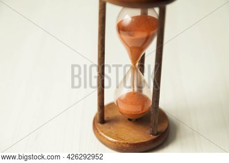 Hourglass With Concept Of Passing Time, Race Against Time, Urgency And Priority. Hours, Days, Weeks,