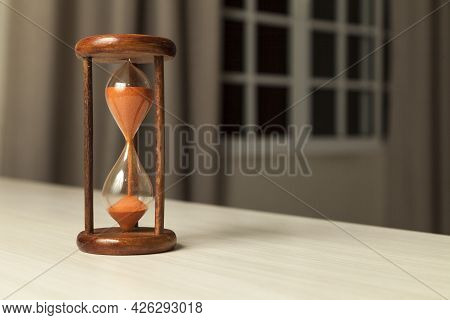 Hourglass With Concept Of Passing Time, Race Against Time, Urgency And Priority. Hours, Days, Weeks,