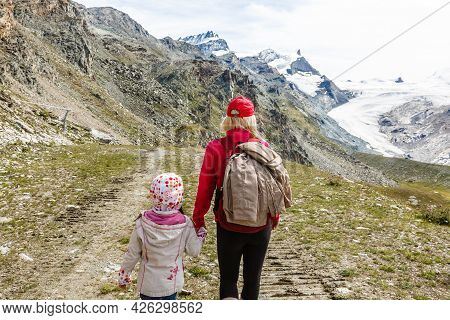 Hiking - Hiker Woman On Trek With Backpack Living Healthy Active Lifestyle. Hiker Girl Walking On Hi
