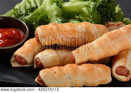 Sausage Buns. Soft Baked Bun (dough )stuffed With Pork Sausage For Fast Food Breakfast Or Coffee Bre
