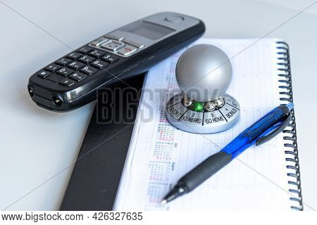 Table With Organizer, Pen And Wheel Of Opportunity, Pointer On You Are Fired, Concept Of Failure