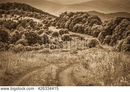Highland Landscape With Storm Clouds In Old Style