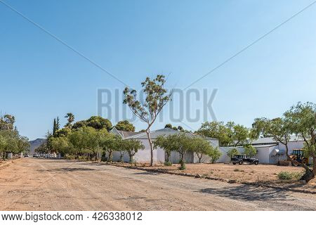 Matjiesfontein, South Africa - April 20, 2021: A Street Scene, With The Transport Museum, In Matjies