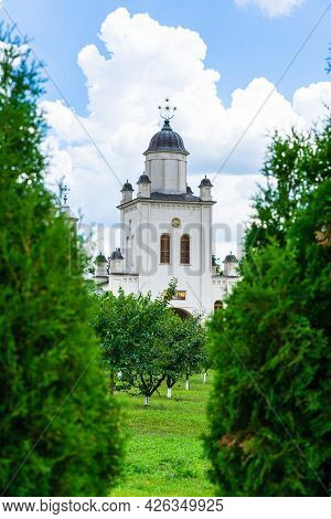 Pasarea Monastery, Orthodox Church Architectural Details. View Of Orthodox Church And Green Churchya
