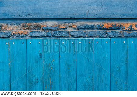 Vintage Wood Background With Peeling Paint And Row Of Dilapidated Bricks. Old Wall Textures Closeup.