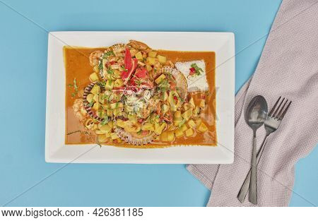 Peruvian Food: Picante De Mariscos With Rice, Sea Food.