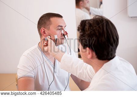 Patient Nerves Testing Using Electromyography At Medical Center