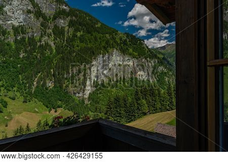 Summer Valley With Grossarler Ache Small River And Blue Cloudy Sky