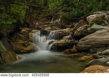 Nice Color Clean Creek Near Huttschag Village In Summer Hot Day