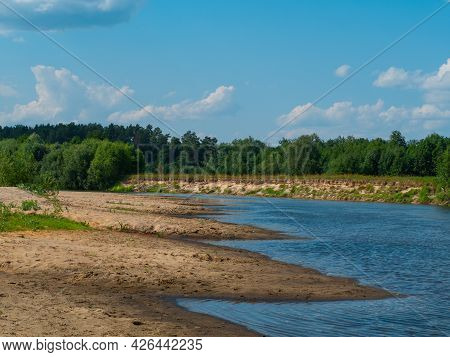 Beautiful Landscape View Of Forest River  And Sandy Beaches Along The River In Summer Sunny Day.
Wid