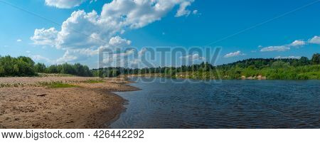 Beautiful Landscape View Of Forest River  And Sandy Beaches Along The River In Summer Sunny Day.
Wid