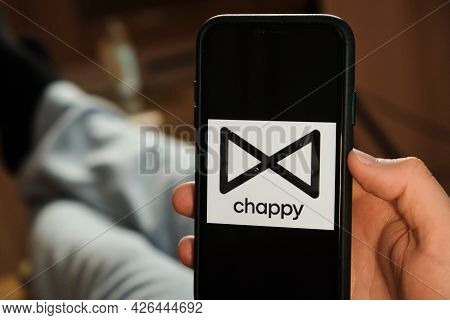 Chappy Logo Of Dating Application On The Screen Of Mobile Phone In Males Hand, June 2021, San Franci