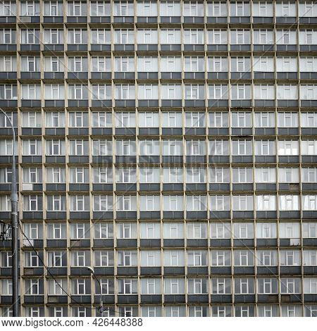 A Fragment Of The Glass And Sandstone Facade Of Modern Office Building. Wide Abstract Fragment Of Mo