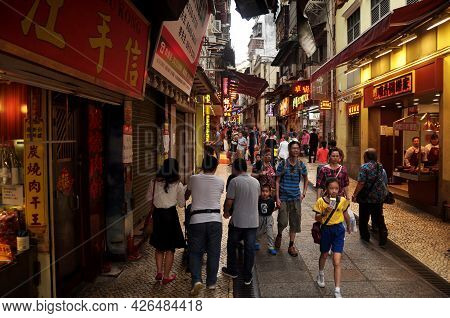 Macanese People And Foreign Travelers Walk Travel Visit Shopping Small Alley Travessa Da Paixao In S
