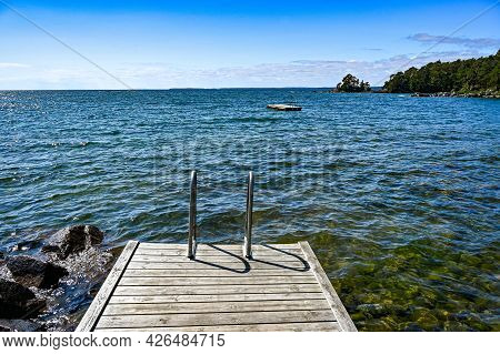 Jetty With Bathing Ladder In Lake Vattern Sweden