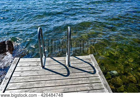 Jetty With Bathing Ladder In Lake Vattern Sweden