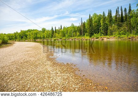 River Taidon Flowing Through The Taiga Forests In South Siberia, Russia