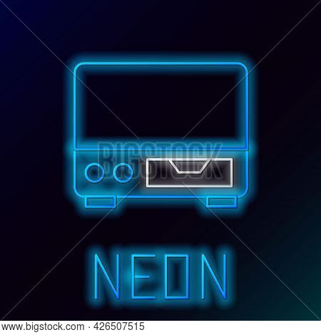 Glowing Neon Line Old Video Cassette Player Icon Isolated On Black Background. Old Beautiful Retro H