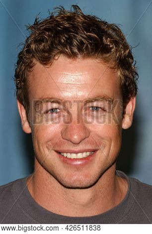 LOS ANGELES - JUN 20: Simon Baker arrives to  TCA Summer Press Tour 2003-CBS Party on June 20, 2003 in Hollywood, CA