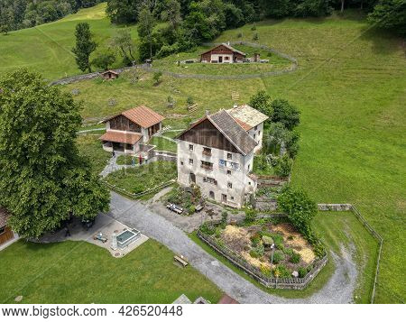 Drone View At The Village Of Heidi Over Maienfeld In The Swiss Alps