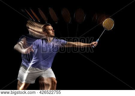 Young Male Badminton Player, Shuttler In Motion And Action On Dark Background. Stroboscope Effect.