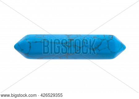 A Blue Turquoise Point Gemstone Used For Healing Photographed Against A White Background