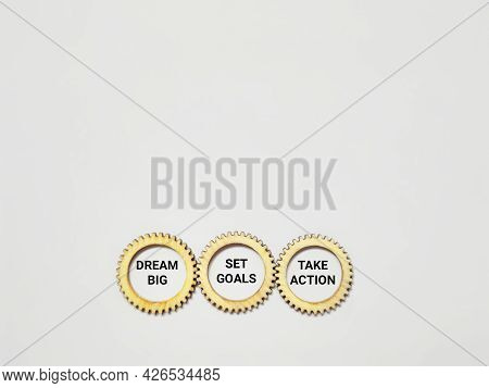 Motivational And Inspirational Text - Dream Big Set Goals Take Action In White Background. Stock Pho