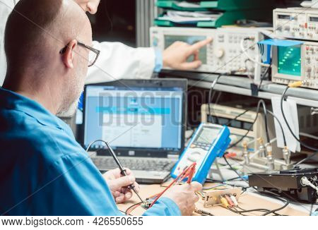 Electronic engineer designing and developing a hardware product
