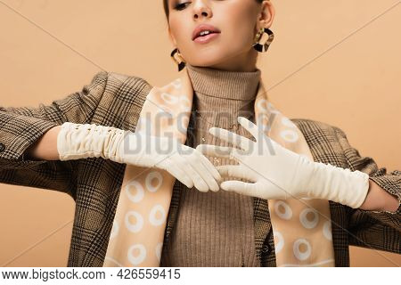 Cropped View Of Fashionable Woman In Blazer, Neckerchief And White Gloves Isolated On Beige