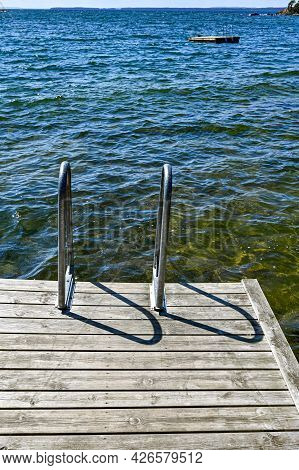 Jetty With Bathing Ladder In Lake Vattern Sweden