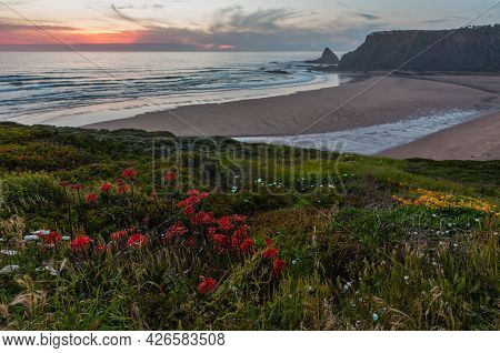 Pink Sunset Ocean Scenery And Summer Odeceixe Beach (aljezur, Algarve, Portugal).
