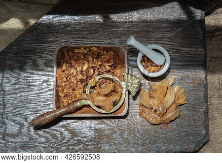 Dried Chilli Paste With Crispy Fish Thai Style Or Crispy Fish Chilli Paste In Ceramic White Cup On W