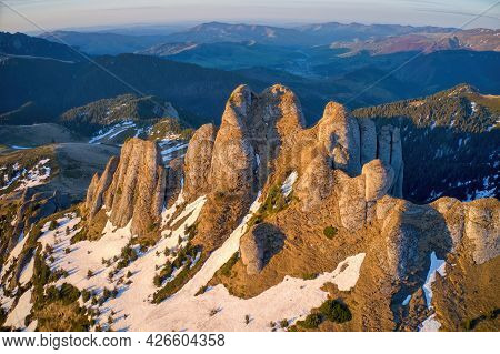 Aerial View Over Ciucas Mountains, Tigaile Mari Peak, Romania, Europe. Morning Light At Sunrise