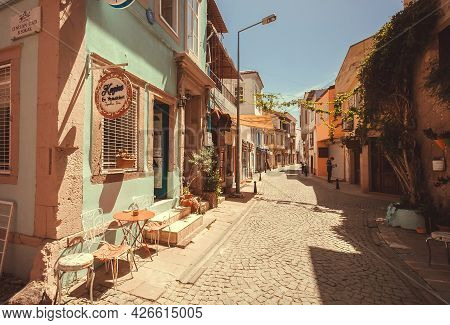 Ayvalik, Turkey: Sunny Street Of Small Turkish Town Without People, But With Cafes And Some Shopson 