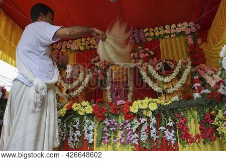 Howrah, West Bengal, India - 7th July 2019 : Hindu Priest Worshipping Idol Of God Jagannath, Balaram