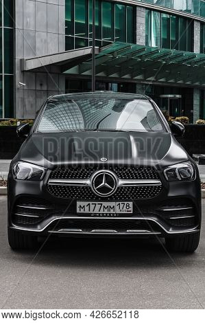 Moscow, Russia - June 2021: Matte Black Mercedes Gle 350d Stands On Parking Slot. Frontal View. Mode