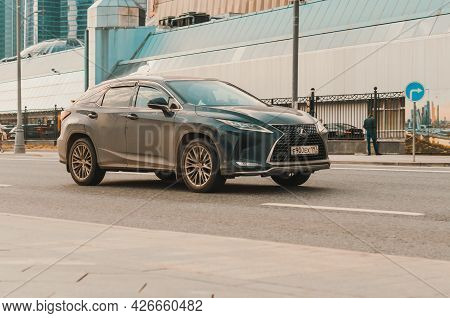 Moscow, Russia - May 2021: View Of Black Lexus Rx Fourth Generation Al20 In Motion Near Moscow City 